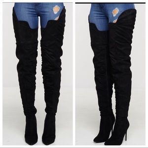 Thigh high black boots