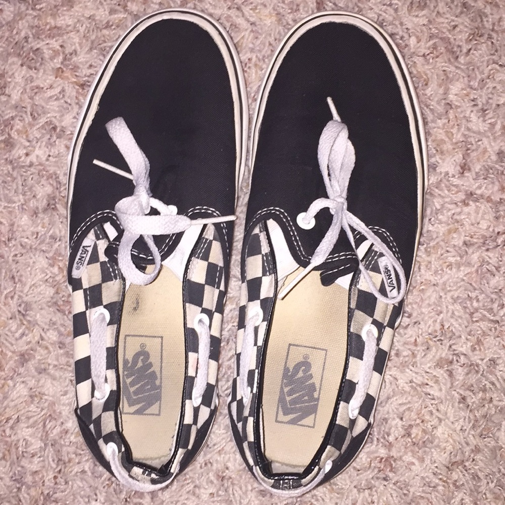 Checkered black and white Vans.