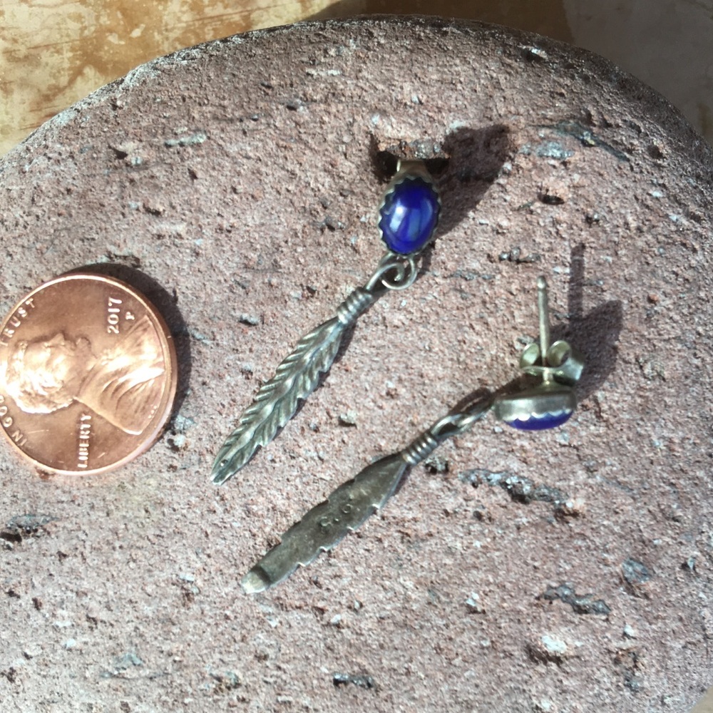 Silver feather earrings