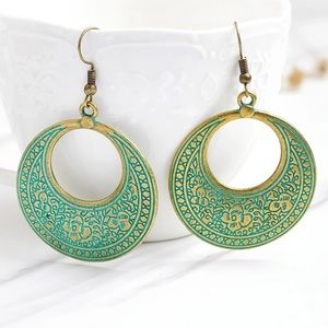 Brand new bronze carved dangle earrings