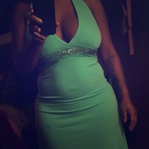 A green strapless evening dress