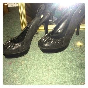 Black Vera Wang heels with gold rinestones.