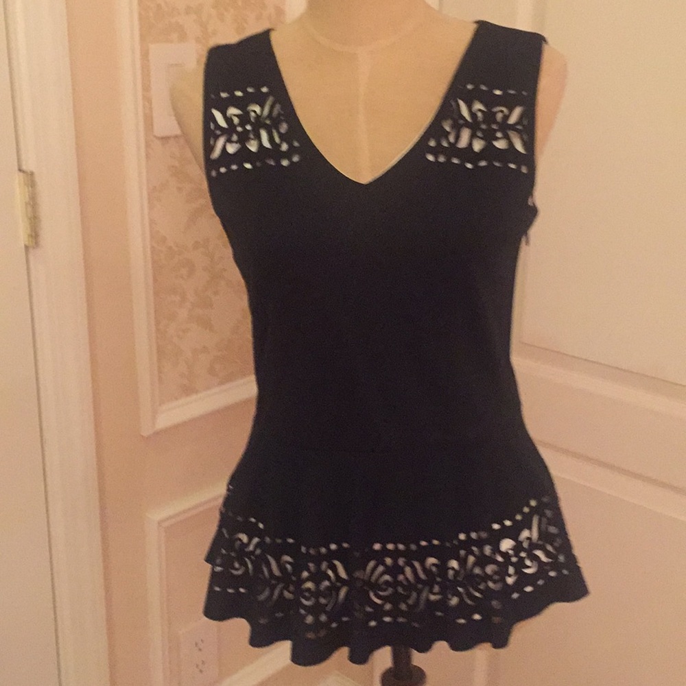 Beautiful cut out peplum blouse