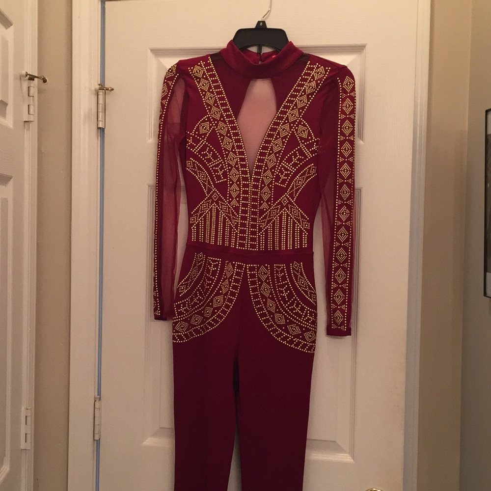 Gold beaded burgundy cat suit