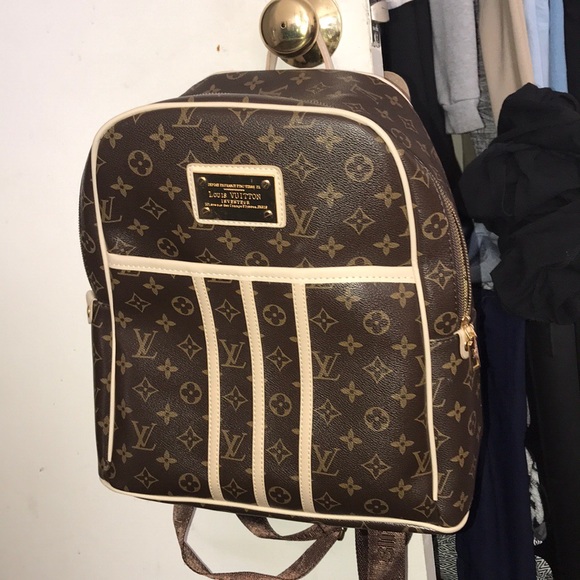Louis Vuitton book bag - Picture 1 of 5