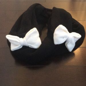 scarf with bow details on each end
