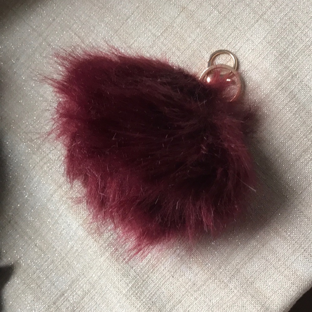 Unused deep red fluffy ball key chain