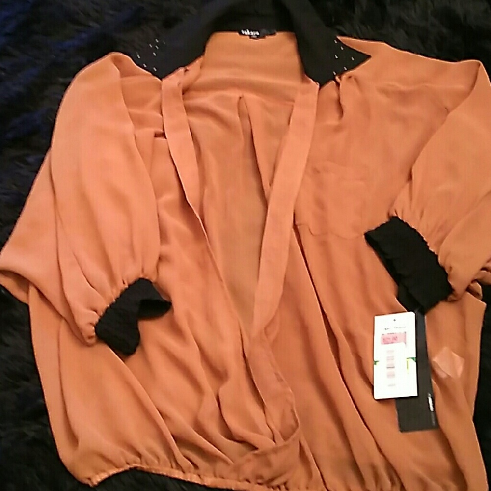 Takara brand new soft and sheer top