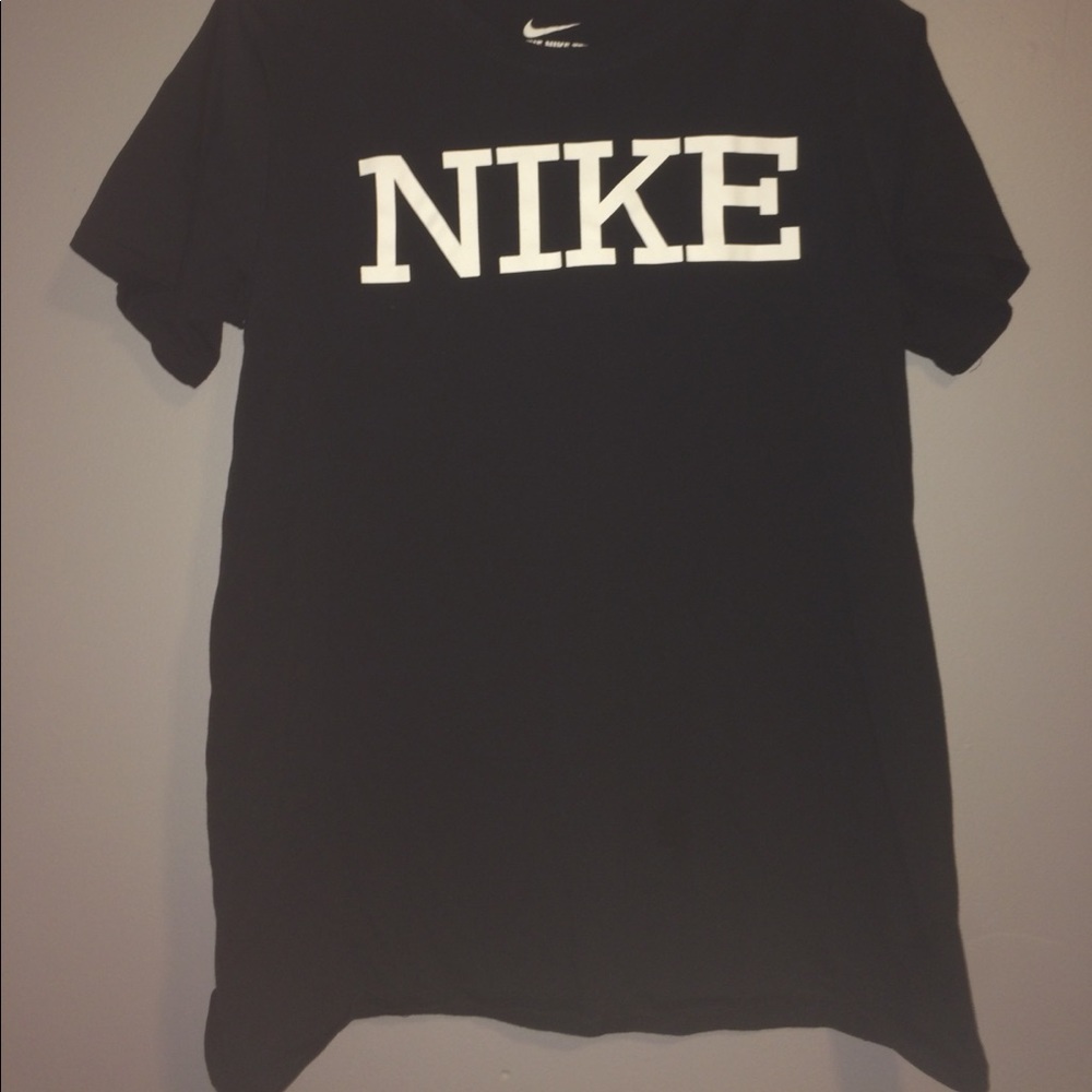 NIKE plain black tee w/ logo. Soft. Small stain