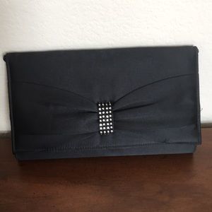 Evening clutch bag with built in shoulder strap