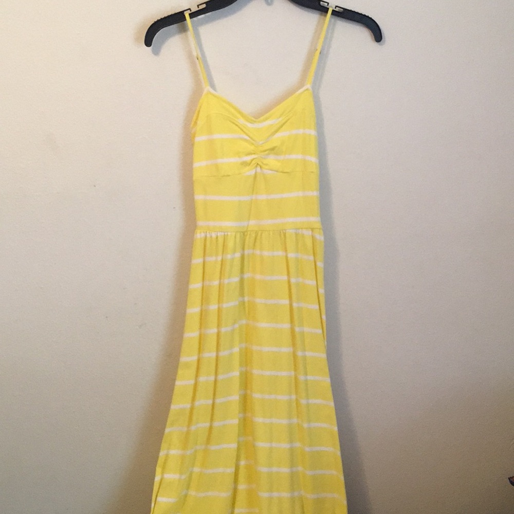 A yellow long summer or spring dress