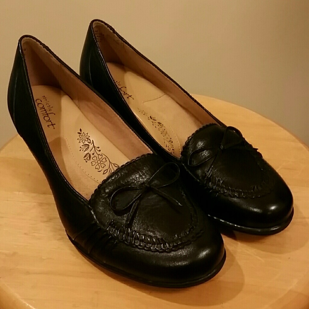 Black leather moccasin heels