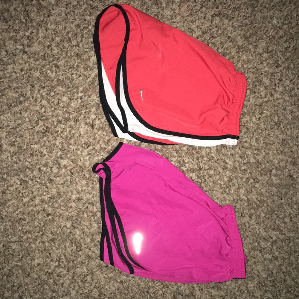 Two Nike running shorts