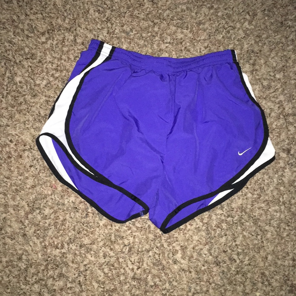 Purple Nike running shorts