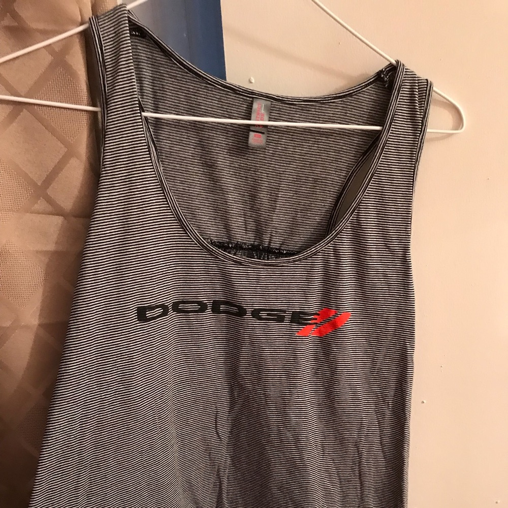 Dodge logo tank with black and white stripes.