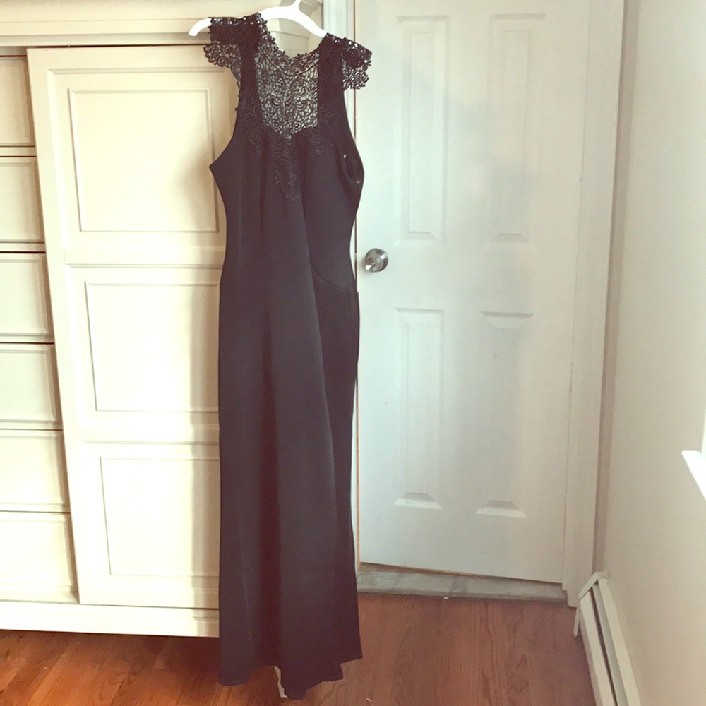 Beautiful black gown with neck detailing NWT