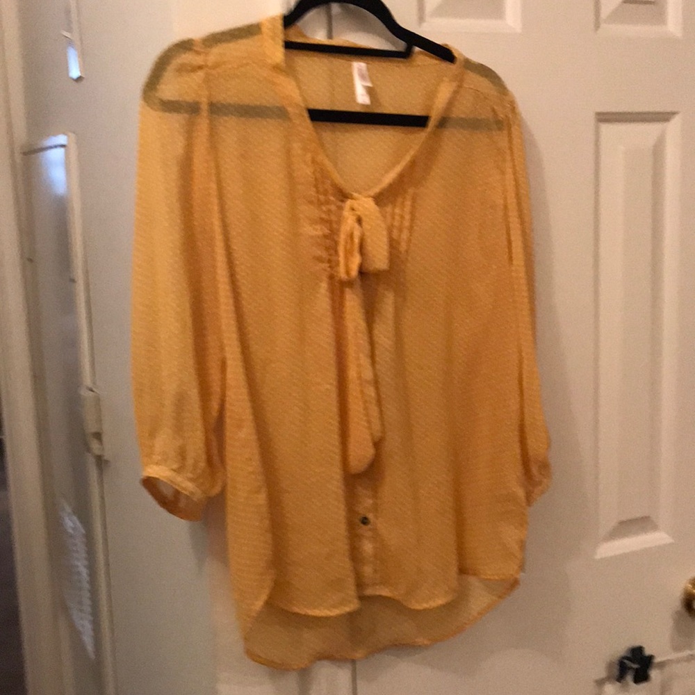 Yellow polka dot shirt