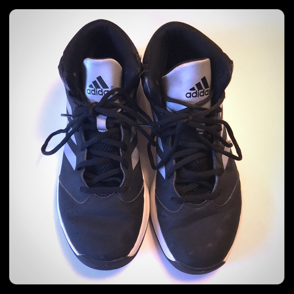 Men’s Adidas basketball shoes.