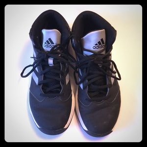 Men’s Adidas basketball shoes.