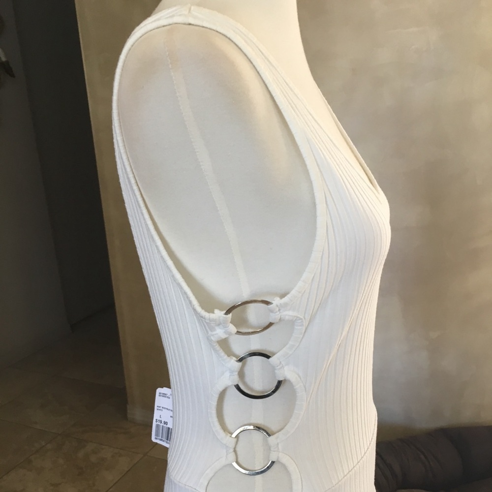 White body suit with ring detail on sides, NWT