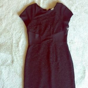 Black stretchy dress.