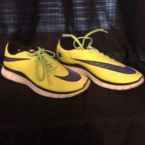 Nike neon yellow with purple Nike symbol shoes