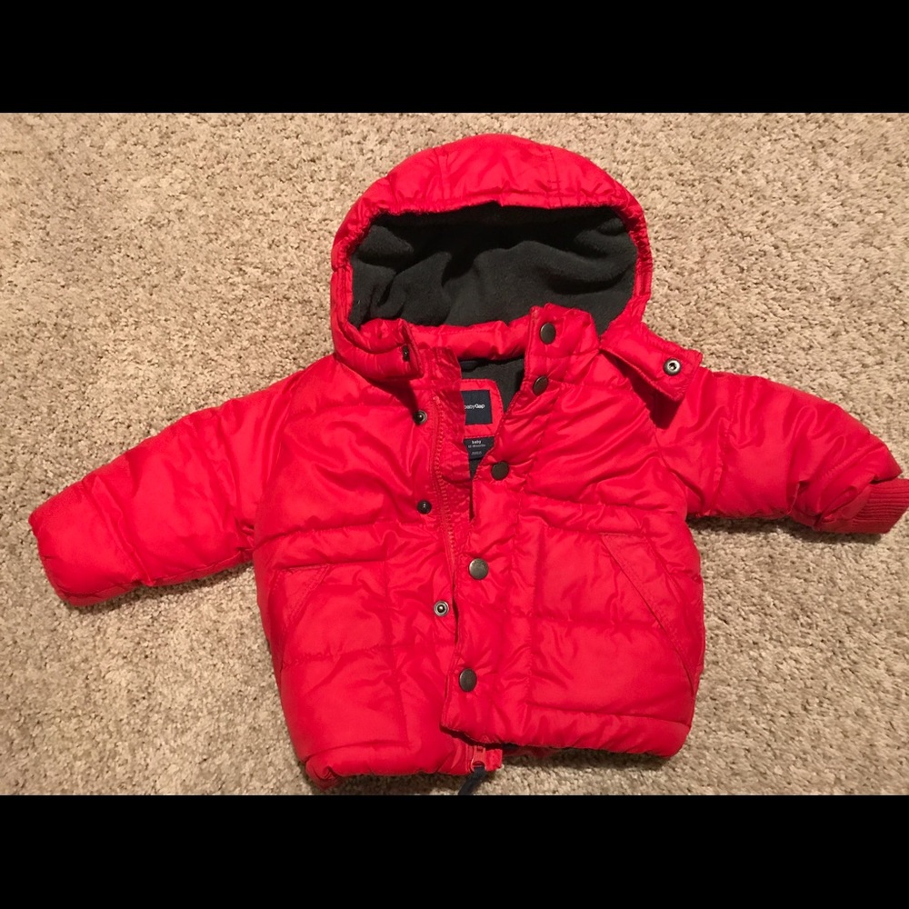 Red puffer baby gap coat. Worn a few times. EGUC.