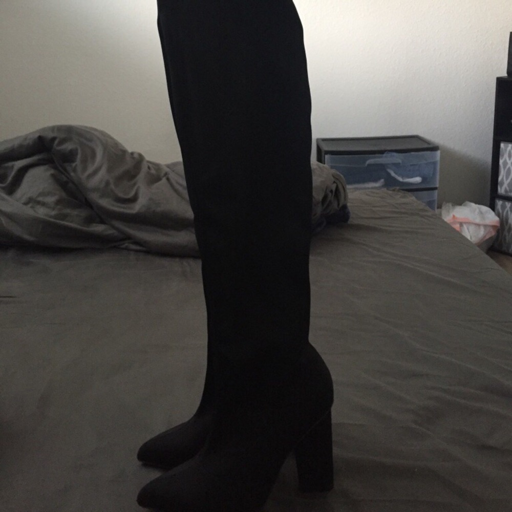 Thigh high black boots