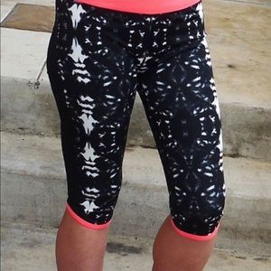 Fabletics Rio Run Capri legging with back zipper.