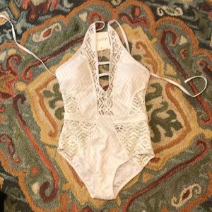 white cut out one piece bathing suit