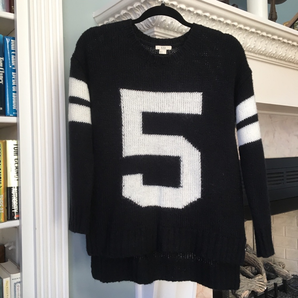 Size S black & white #5 sweater.