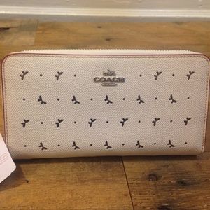 Coach perforated zip wallet