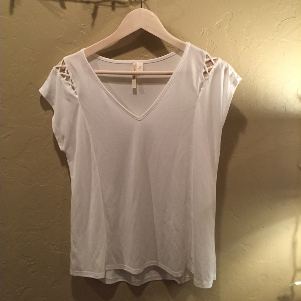 White vneck, shirt sleeve, shirt.
