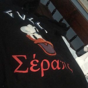 Gucci sweater with Daffy Ducks face