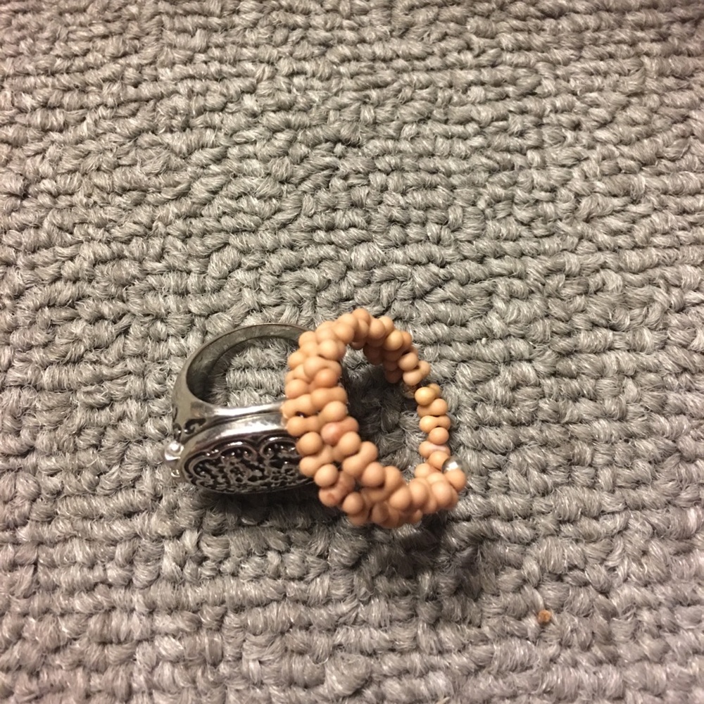 Adjustable pink beeded ring