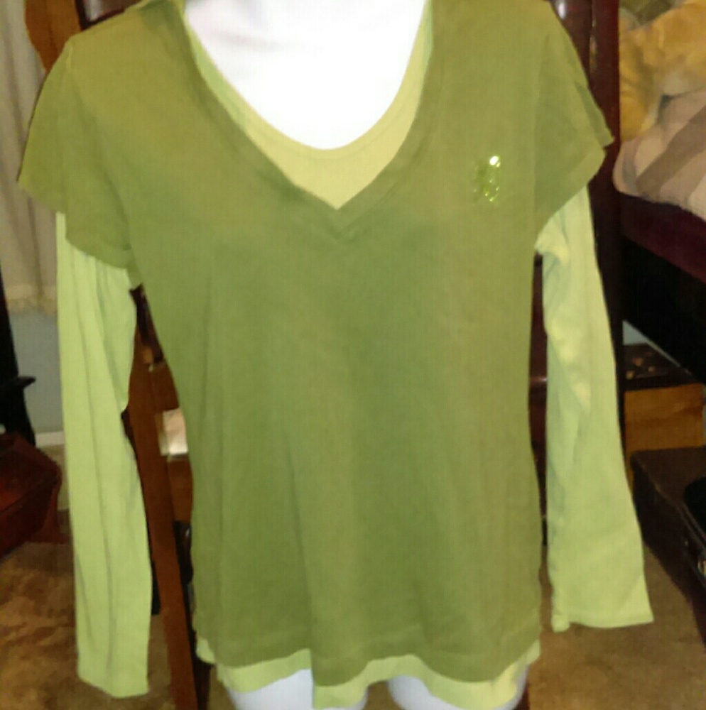 Two tone long sleeve shirt with a hood.