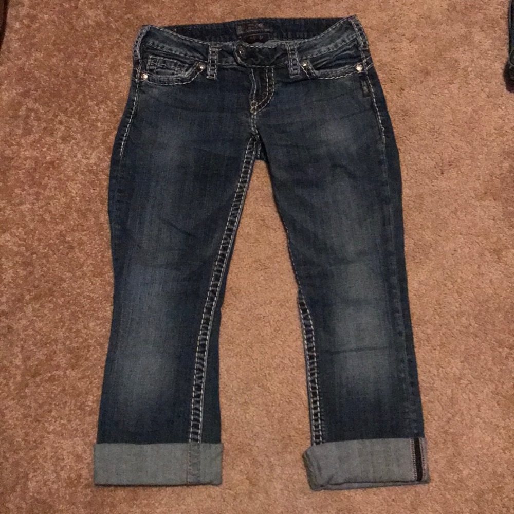 Women’s silver jeans cut into capris
