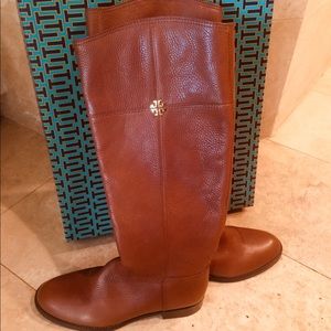 Tory Burch boots basically brand new.