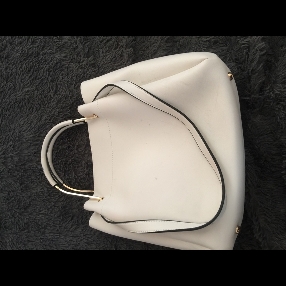 Hire sleek vegan purse