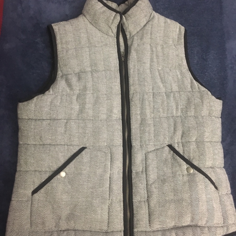 Black and white puffy vest. Very warm and comfy.