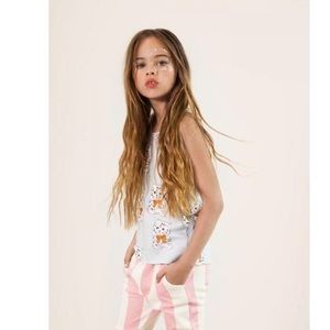 Hugo loves Tiki Kitty tank