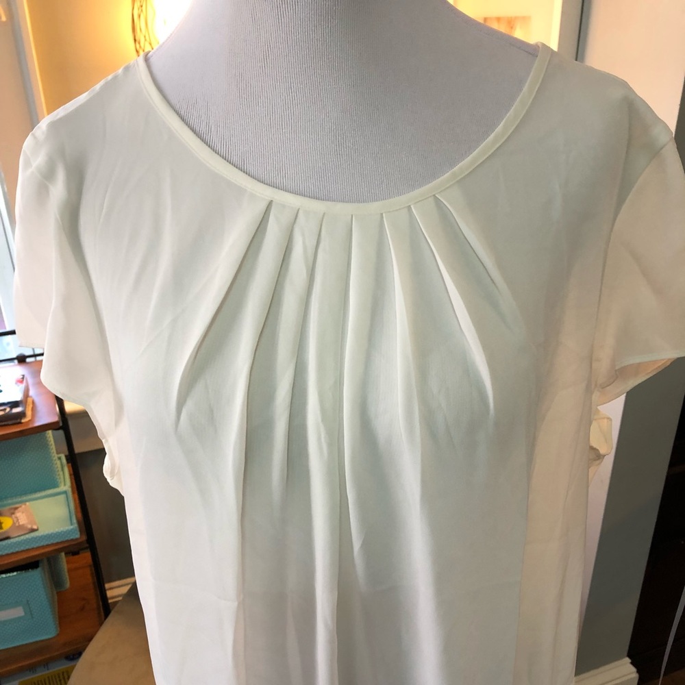 Ann Taylor cream peplum blouse. Sz XL. GUC!