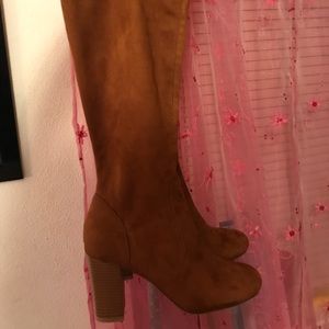 Knee high heeled boots