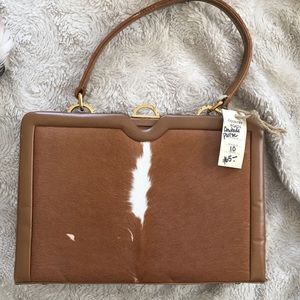 Vintage cowhide purse with vintage purchase price!