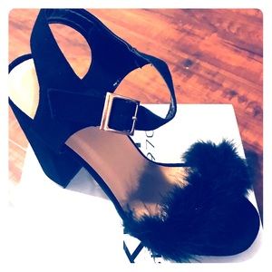 Black suede pump with toe strap feather detail