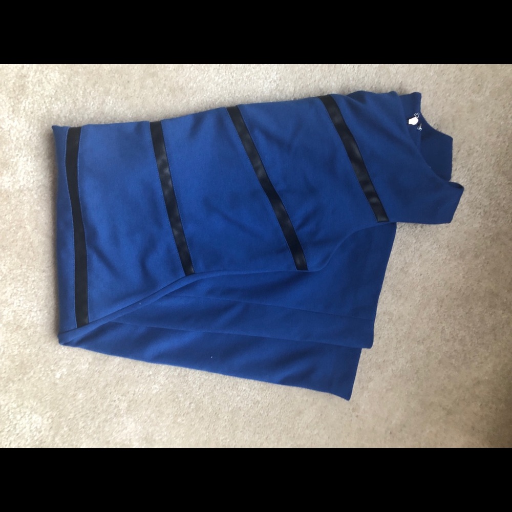 Blue dress/black leather stripes by Ivanka Trump