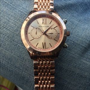 Rose gold never worn structure watch