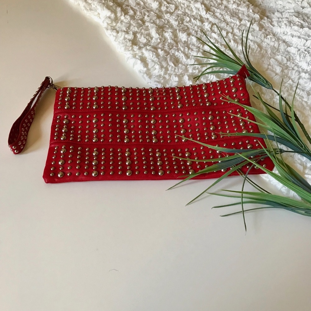 Red studded clutch purse