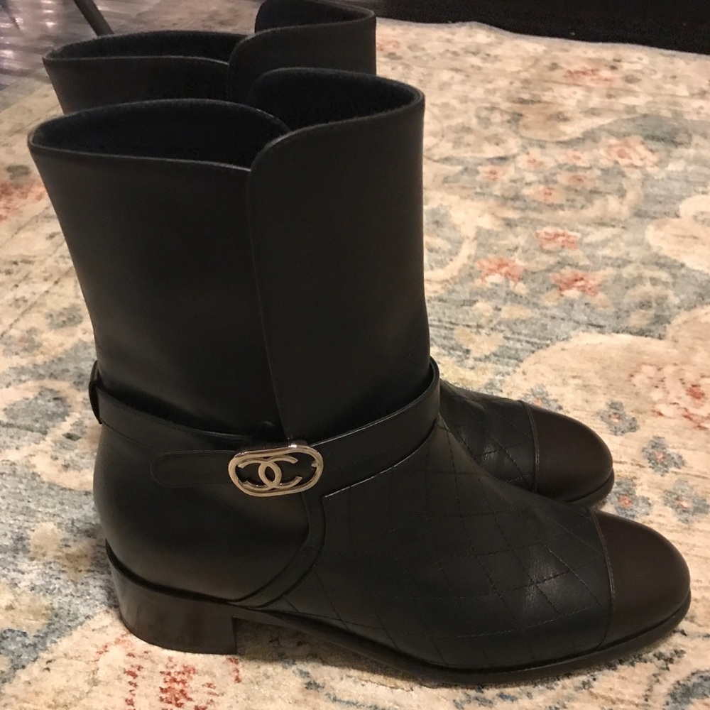 Quilted black Chanel boots with brown toe caps