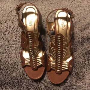 Gold and camel colored wedge sandals